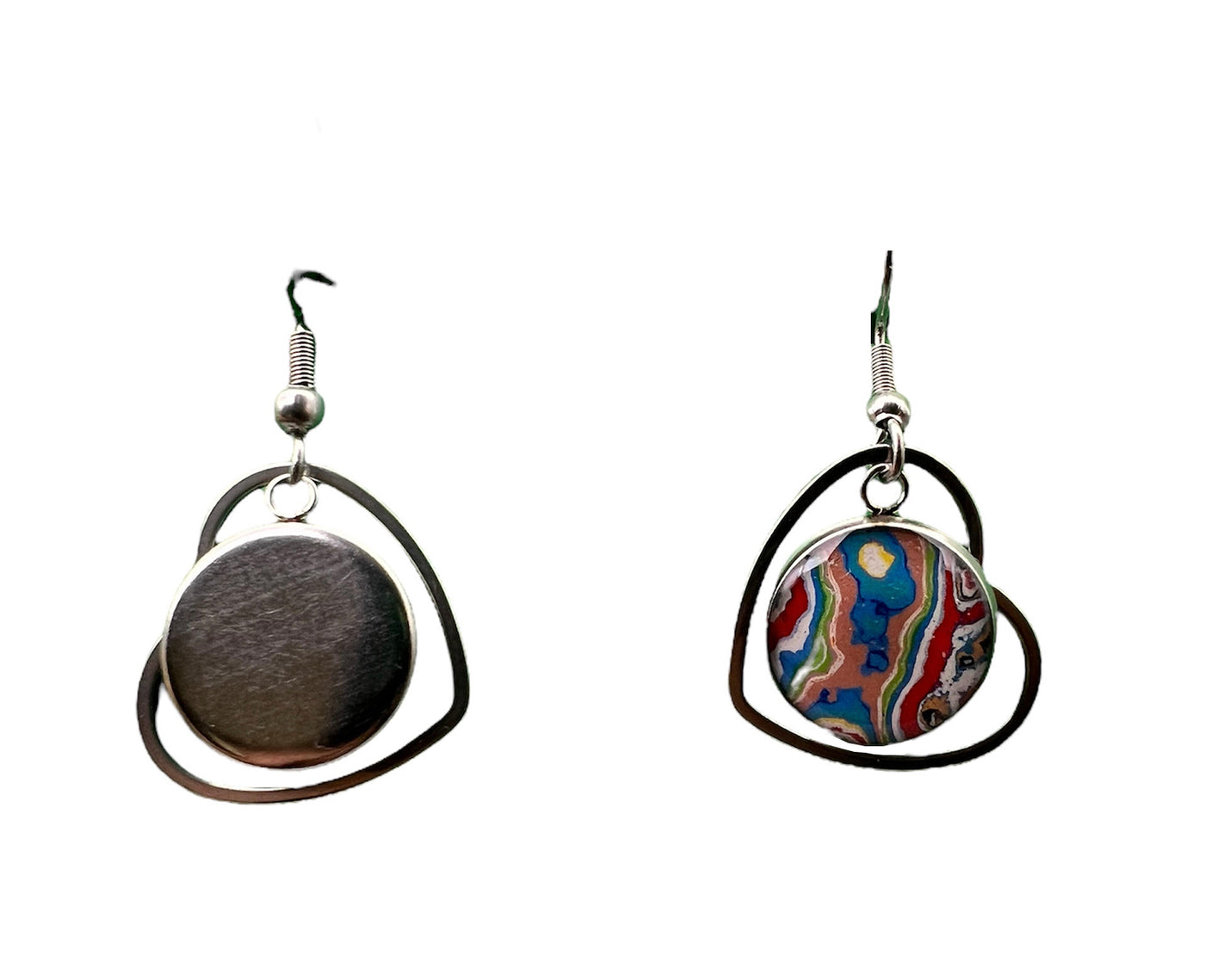 Circle dangle earrings inside heart